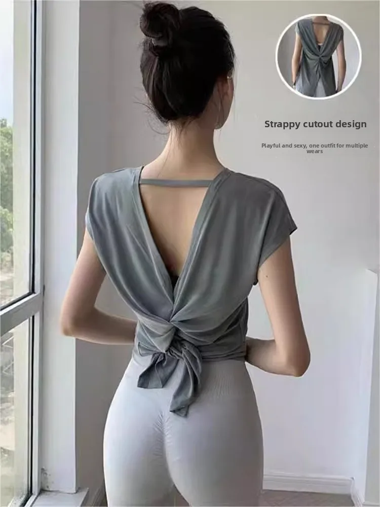

ean Hollow out Yoga Top Women's Summer Thin ort Sve T-irt Slim Fit Pilates Vest Bal round Ne ort Length