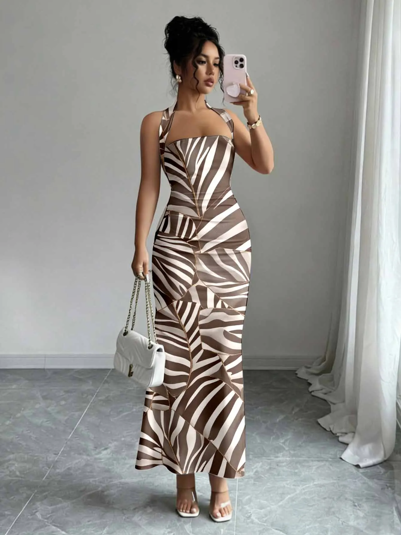 Women's neck-worn waist-tied dress with minimalist backless design for a refined feminine look