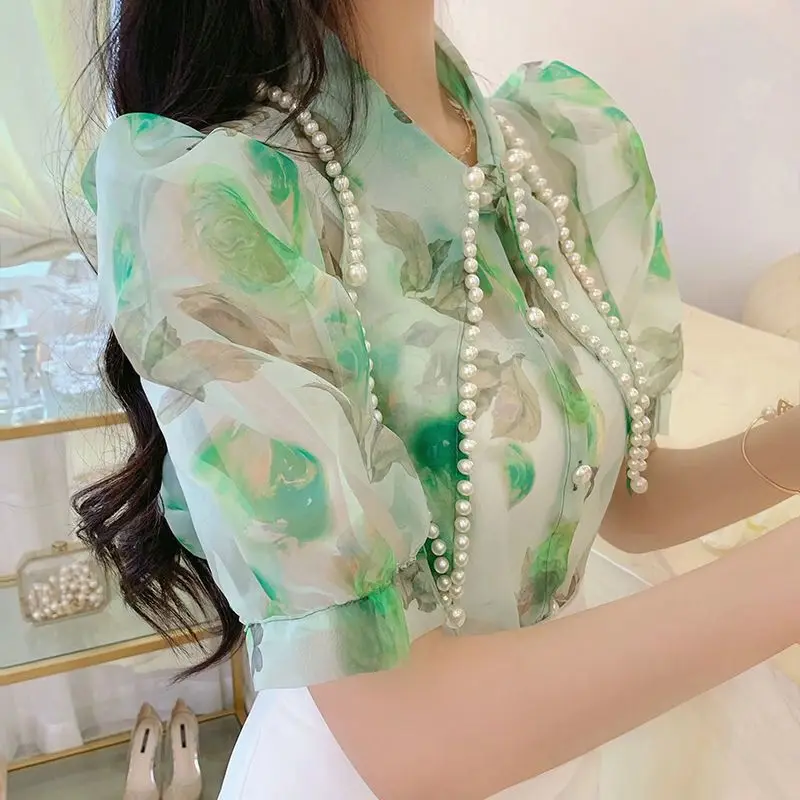 Shirt women's new niche design in the summer of 2024 printed large pointed collar heavy industry beaded short-sleeved shirt
