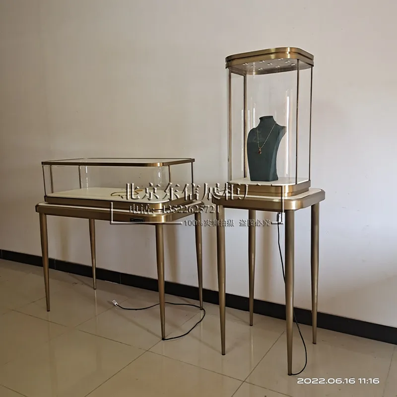 Custom.High-end Customized Stainless Steel Jewelry Display Cabinet, Luxurious Rose Gold Showcase, for Jewelry Store Display.