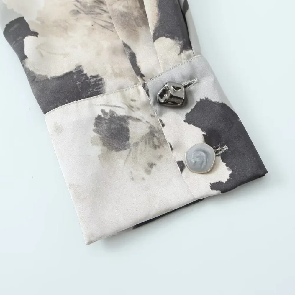 2025 nouveau haut ample pour femmes avec col manches longues bouton imprimé printemps et été nouvelle chemise de mode