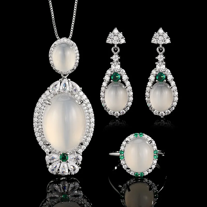 

Vintage Oval White Gemstone Jewelry with Emerald Adjustable Ring Necklace Drop Earrings Elegant Statement Evening Wear Jewelry