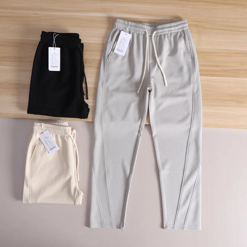 

Water-Resistant Air-Layered Men's Casual Pants Elastic Waist Sweatpants Faionable Spring Autumn Straight Leg Urban Sle