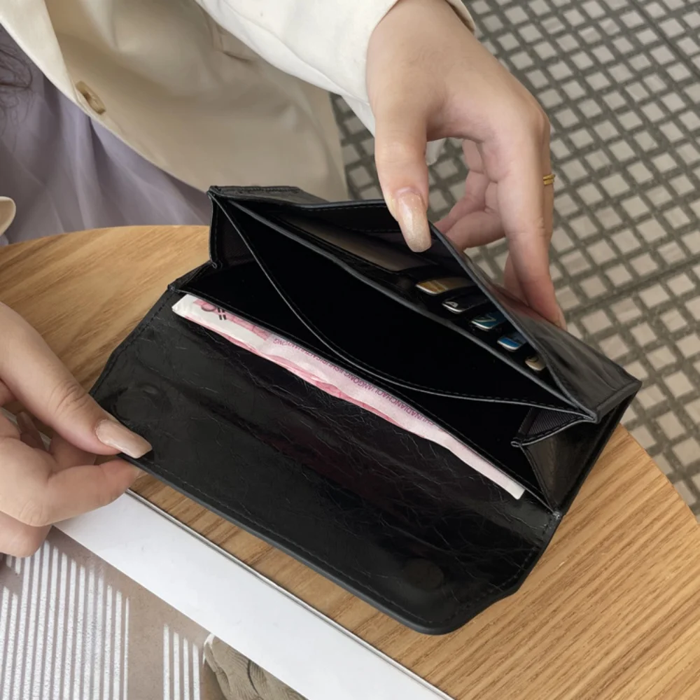 กระเป๋าสตางค์หนังวัวแท้แบบยาว พร้อมคลิปหนีบเงิน ดีไซน์หรูหรา สำหรับผู้หญิง เหมาะเป็นของขวัญสำหรับงานเลี้ยงอาหารค่ำหรือโอกาสพิเศษ