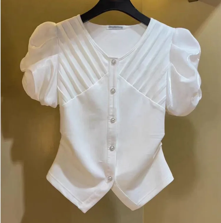 

French fashion temperament V-neck bubble sleeve short sleeve T-shirt female summer new slim short versatile chic beautiful top.