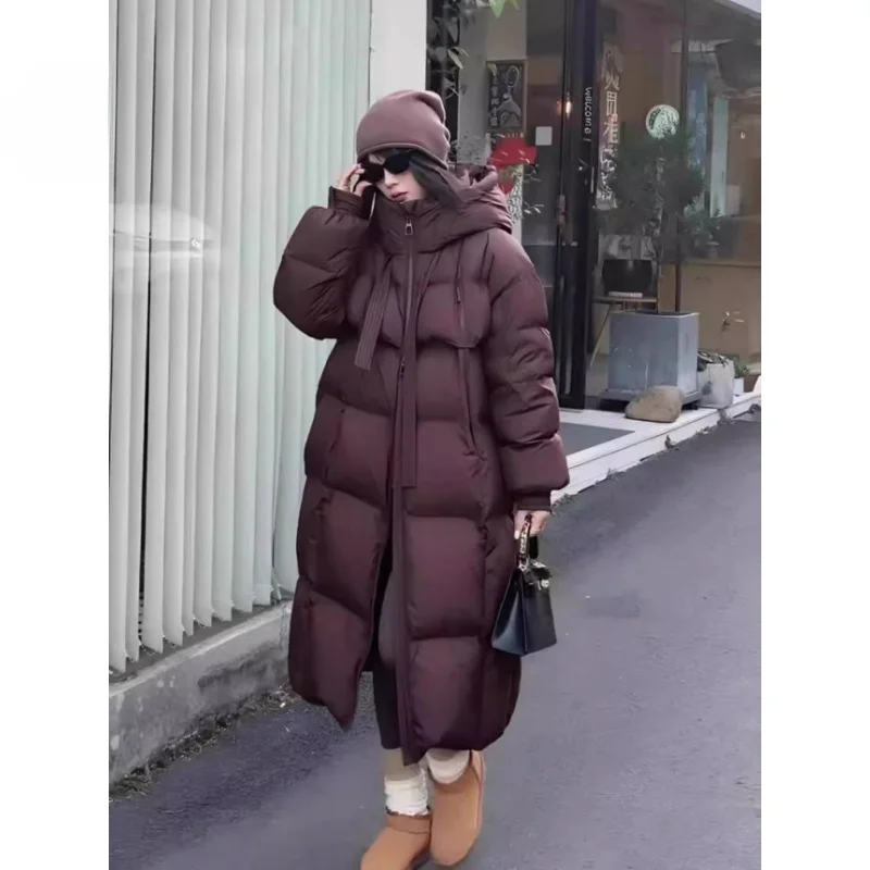 Modische Daunen jacke, koreanische Version mit Kapuze, dicke und lockere, mittellange, knielange Brot jacke, Damen Winter neu 2024