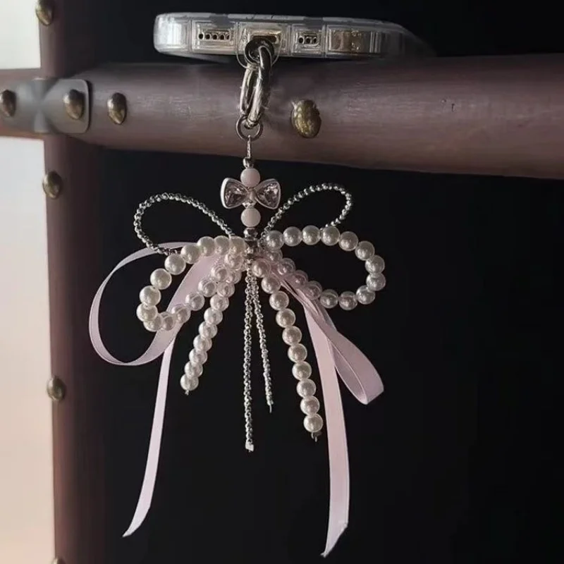 2025 جديد الكورية موضة الحلو اللؤلؤ القوس المفاتيح قلادة هاتف كيرينغ Y2K Ins حامل الجمالية لفتاة حقيبة قلادة اكسسوارات