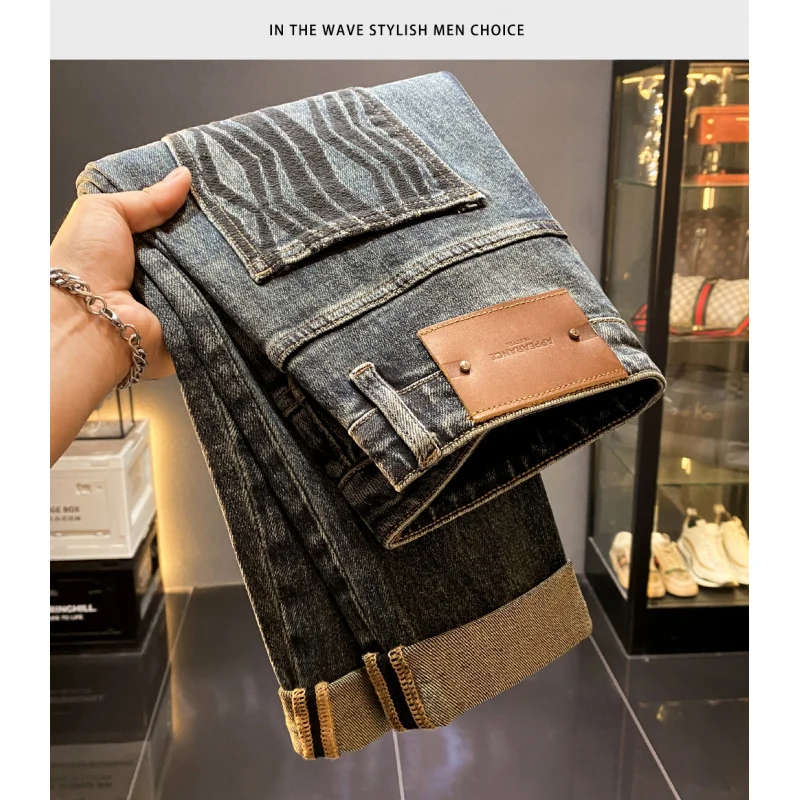 

Autumn men's jeans high-end trend embroidered slightly loose Haren tapered small foot casual pants