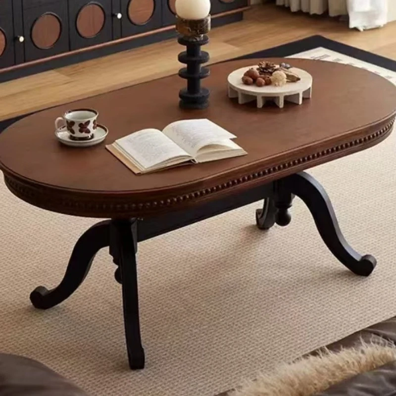 

French medieval solid wood coffee table design oval tea table retro relief living room home small tea table high-end creativity