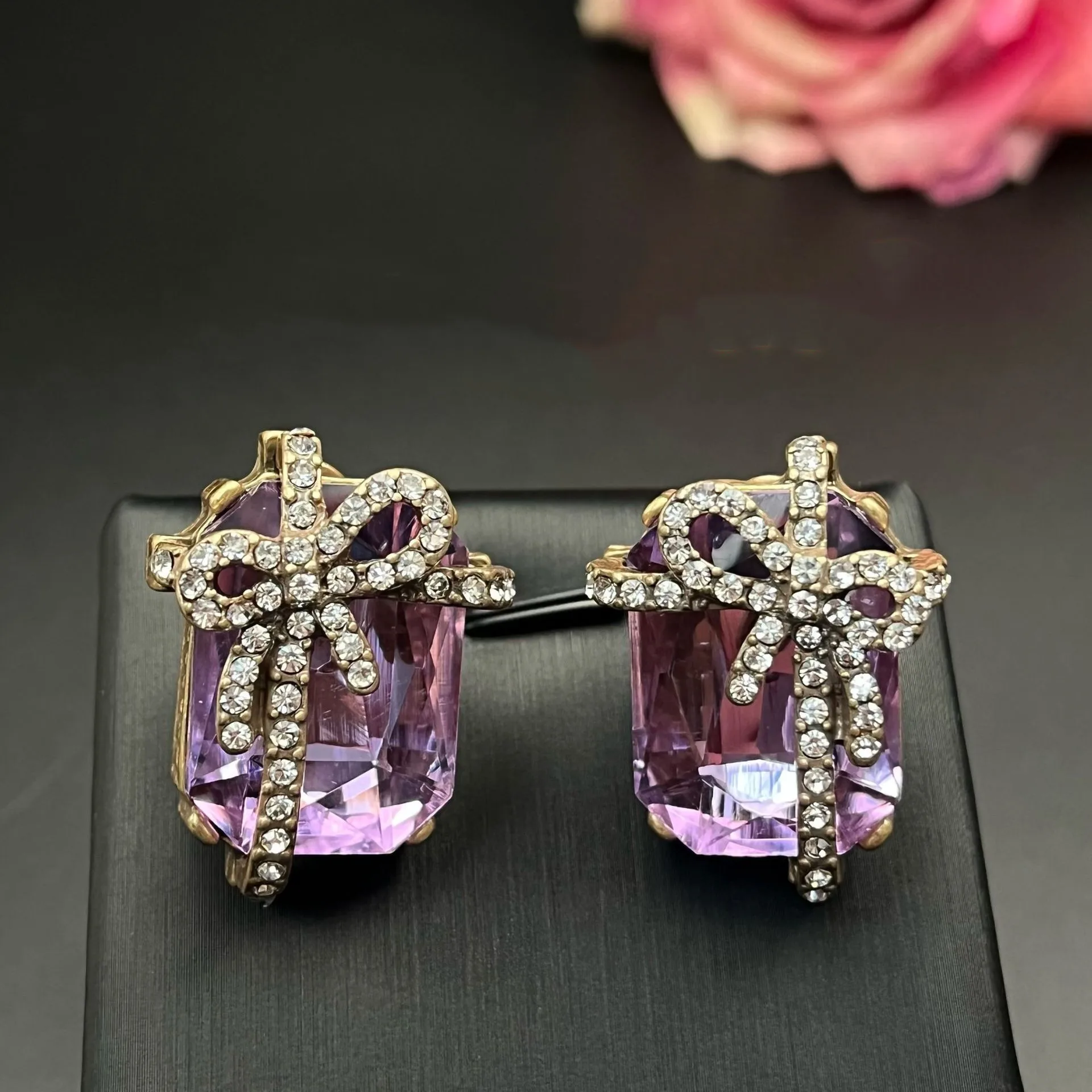 

Sweet and dreamy purple crystal bow earrings