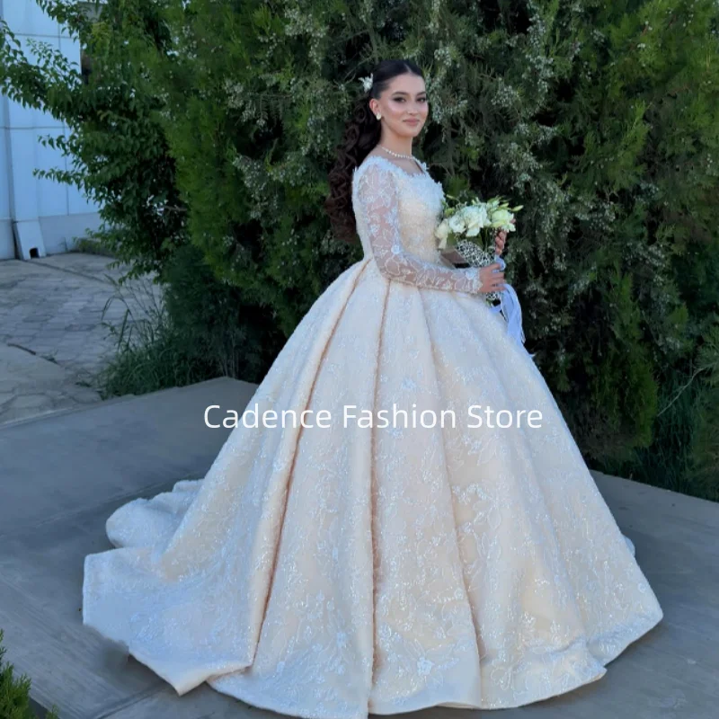 Luxuriöses Arabisches Hochzeitskleid in Elfenbein mit Perlen, Pailletten und Stickereien, Transparentes Langarm-A-Linien-Brautkleid nach Maß