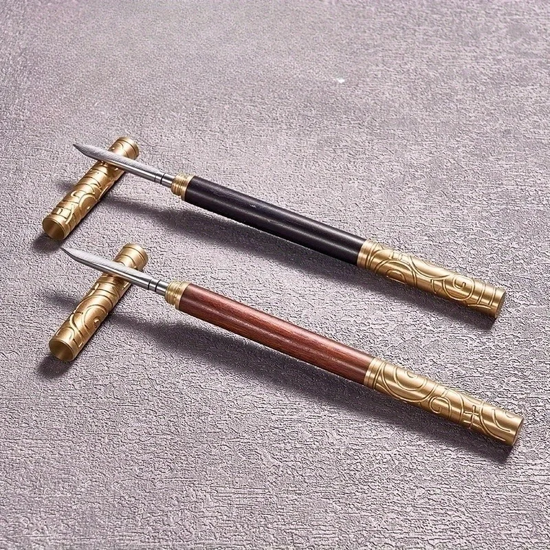 

Золотой чайный нож из дерева