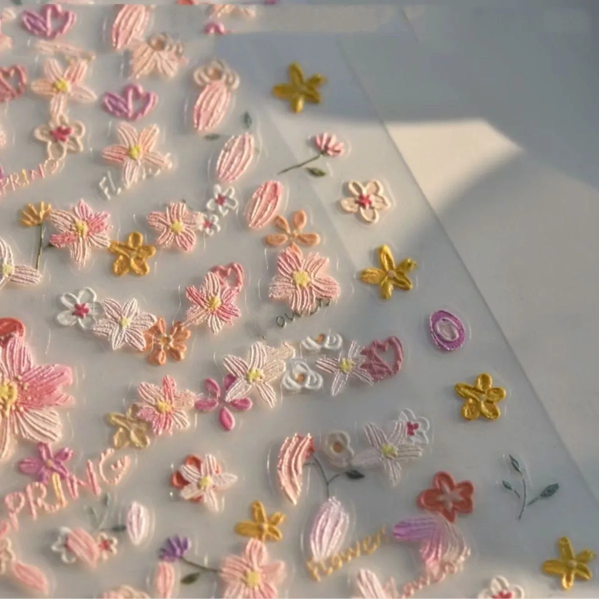 

New spring nail art: dainty wildflower embossed stickers - romantic oil painting style, fresh, minimalist, and cute nail decals