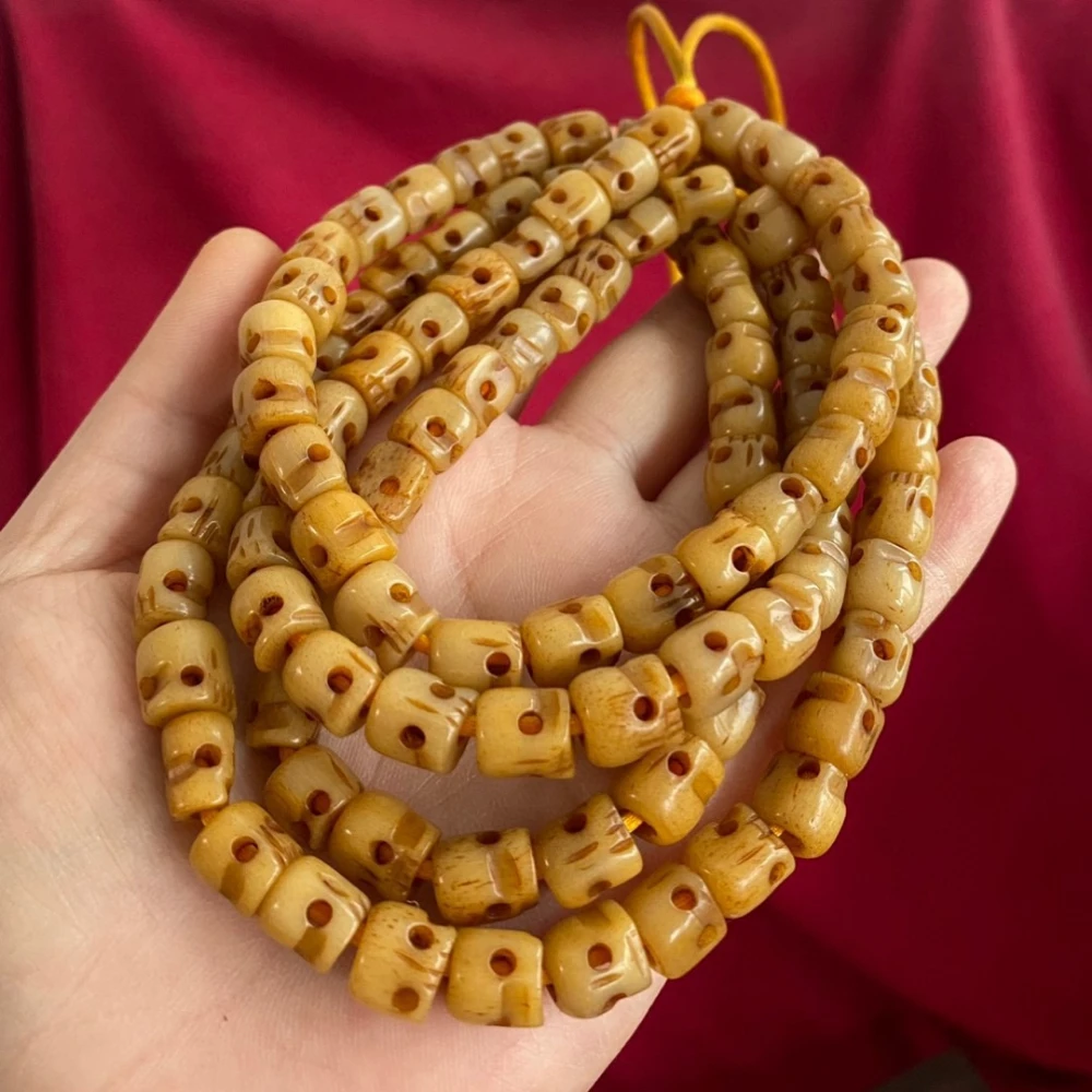 

Бусы-оберег из 108 бусин в тибетском стиле: череп из кости быка, бусины из кости старой души