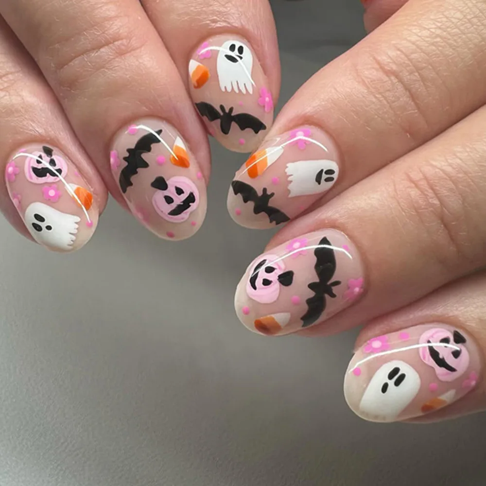 24 Stück Künstliche Nägel mit Halloween-Designs wie Kürbis, Geist und Fledermaus in Niedlichen Rosa-Tönen, Aufklebenägel Perfekt als Geschenke für Mädchen und Freunde – Detail 1