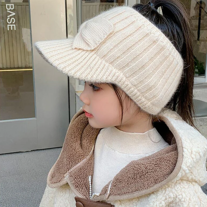 

Шерстяная шапка с открытым верхом и защитой для ушей, вязаная бейсболка с бантом, зимняя теплая шапка с защитой для ушей для детей 3-10 лет, шерстяная шапка