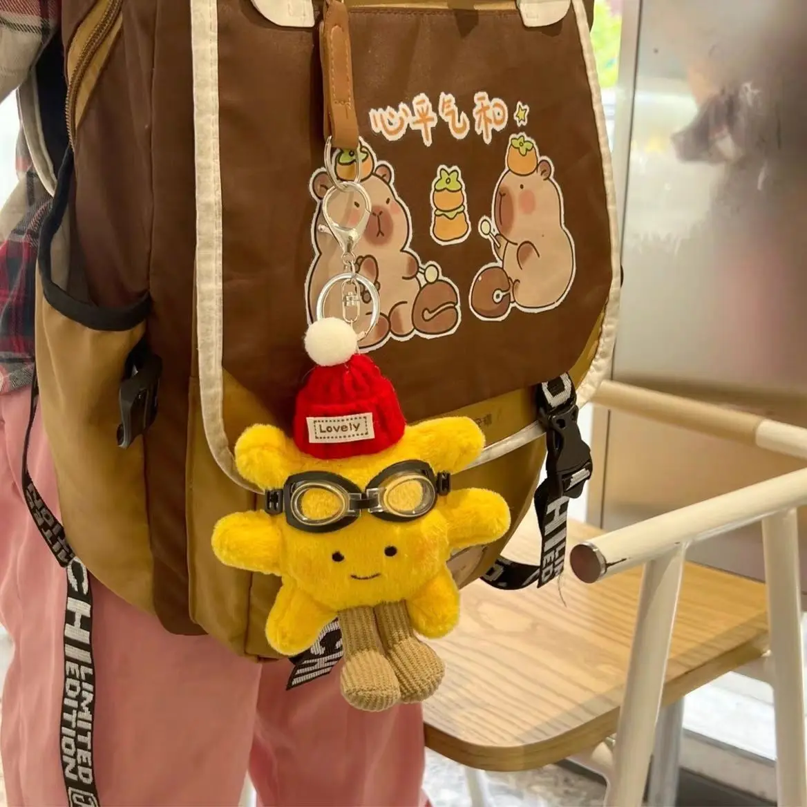 

1/9pcs Warm Little Sun Plush Keychain Hat-Wearing Goggles Healing Sun Figurine Bag Charm Adorable and Exquisite Little Doll