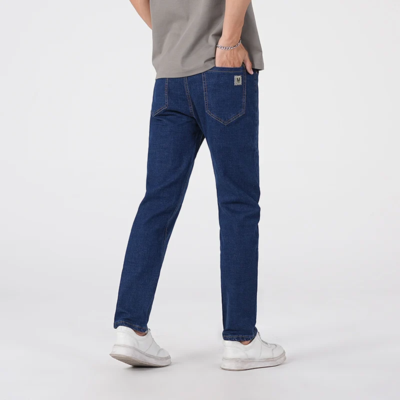 جينز رجالي لخريف وشتاء 2025 نمط عمل خفيف غير رسمي بقصة ضيقة سروال طويل عصري متعدد الاستخدامات مقاس كبير 38