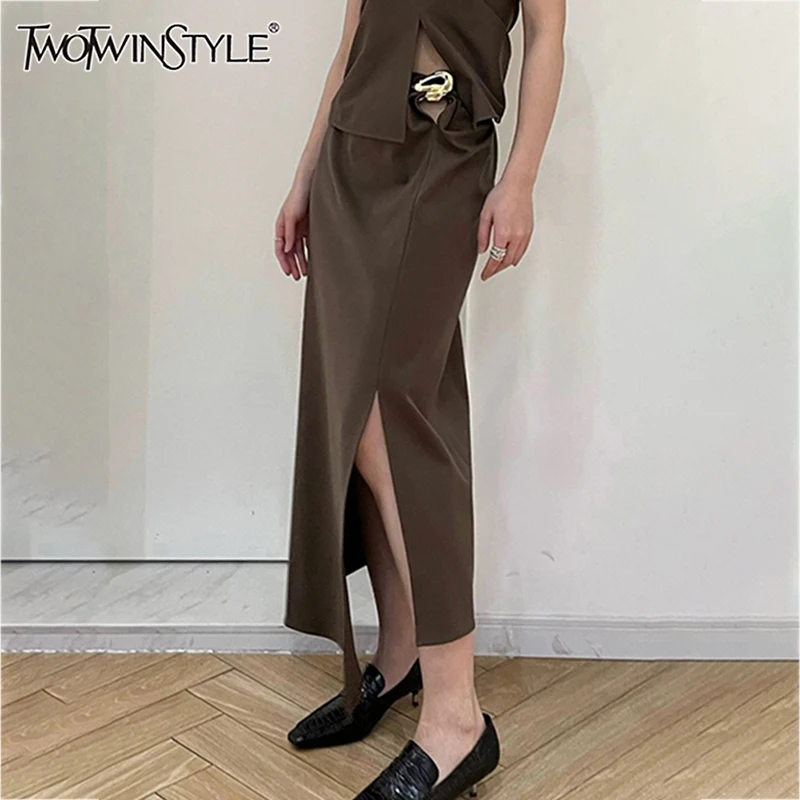 

TWOTWINSTYLE Solid Metal Button Elegant Skirt For Women High Waist Split Slimming Temperament Skirt Female Fashion Style Clothes