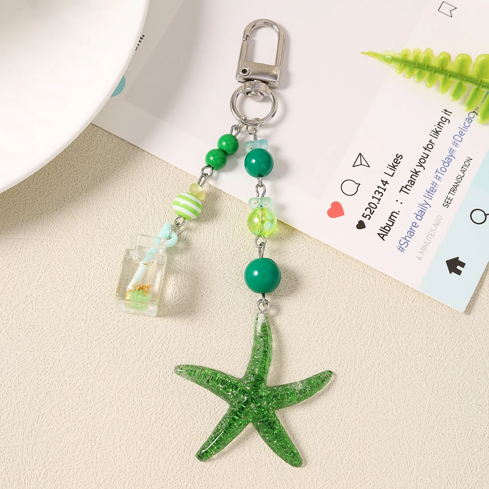 Aihua Niedlicher Y2K-Schicker Sommer-Strand-Seestern-Schlüsselanhänger für Damen und Mädchen, Handtaschenanhänger, Air Pad Hülle, Riemen, handgefertigter Schmuck, Geschenke – Detail 2