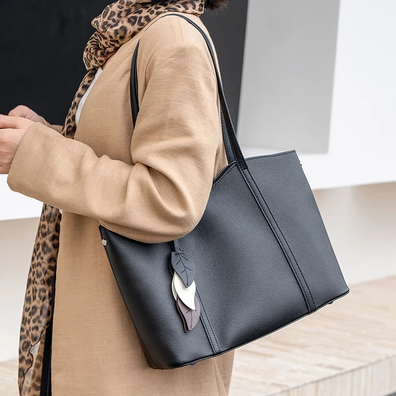 Bolso de mano de cuero genuino para mujer, de gran capacidad, de cuero real, para oficina, con colgante de hoja decorativo, bolso de compras diario para damas.