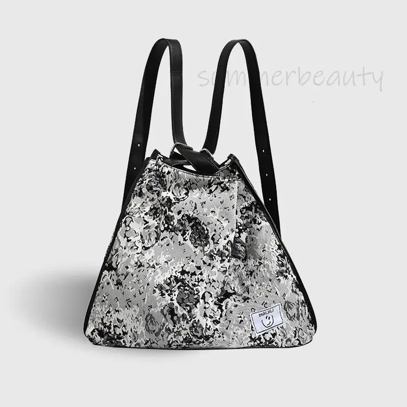 

Light Luxury Fashion Top Layer Cowhide Gradient Jacquard Canvas Splicing Square Women Bag Portable Multifunctional Backpack Tide