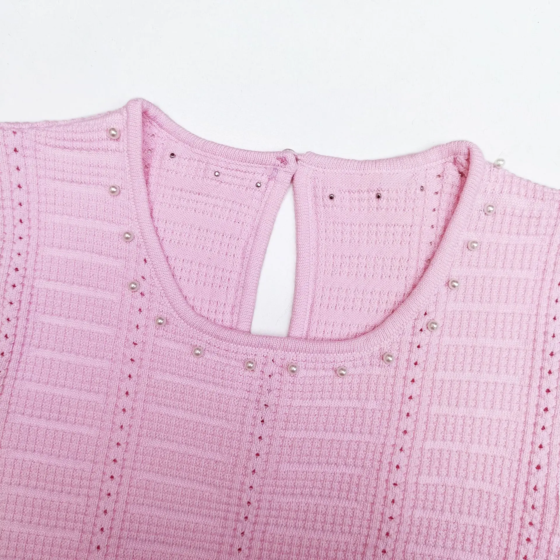 ZJYT été mode perles perles sans manches robe en tricot femmes 2025 nouveau élégant col rond évider Midi décontracté robe de vacances