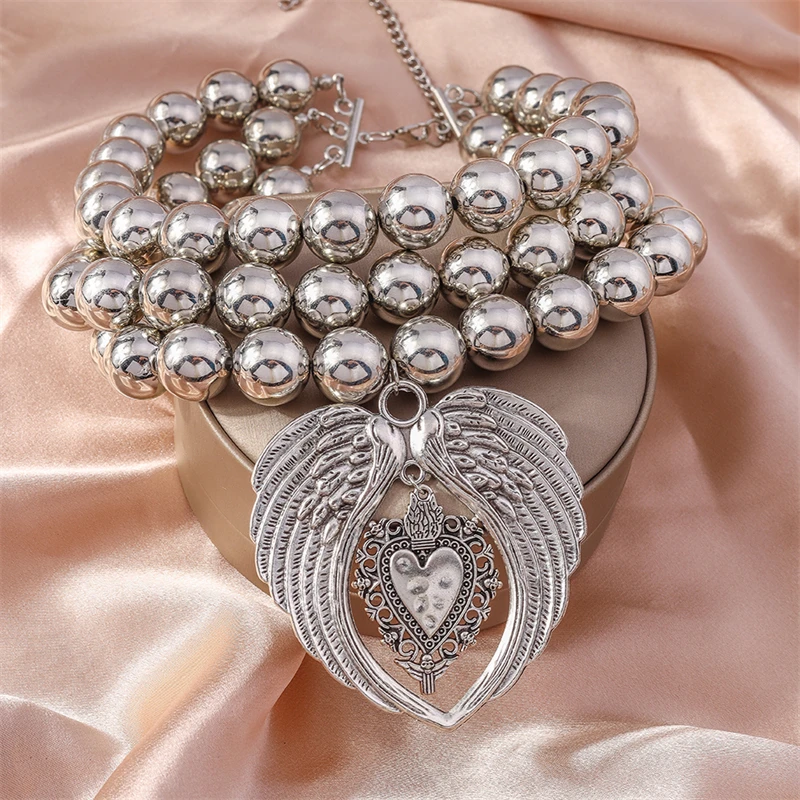 Punk Übertriebene Handgemachte Perlen Halskette für Frauen Metall Flügel Herz Anhänger Choker Halskette Mädchen Party Festival Schmuck Geschenke – Detail 5