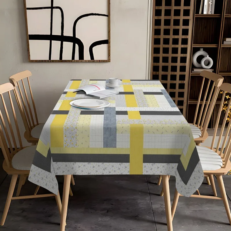 One modern geometric patchwork tablecloth, enhancing the simplicity of the dining room style. Polyester fiber tablecloth.