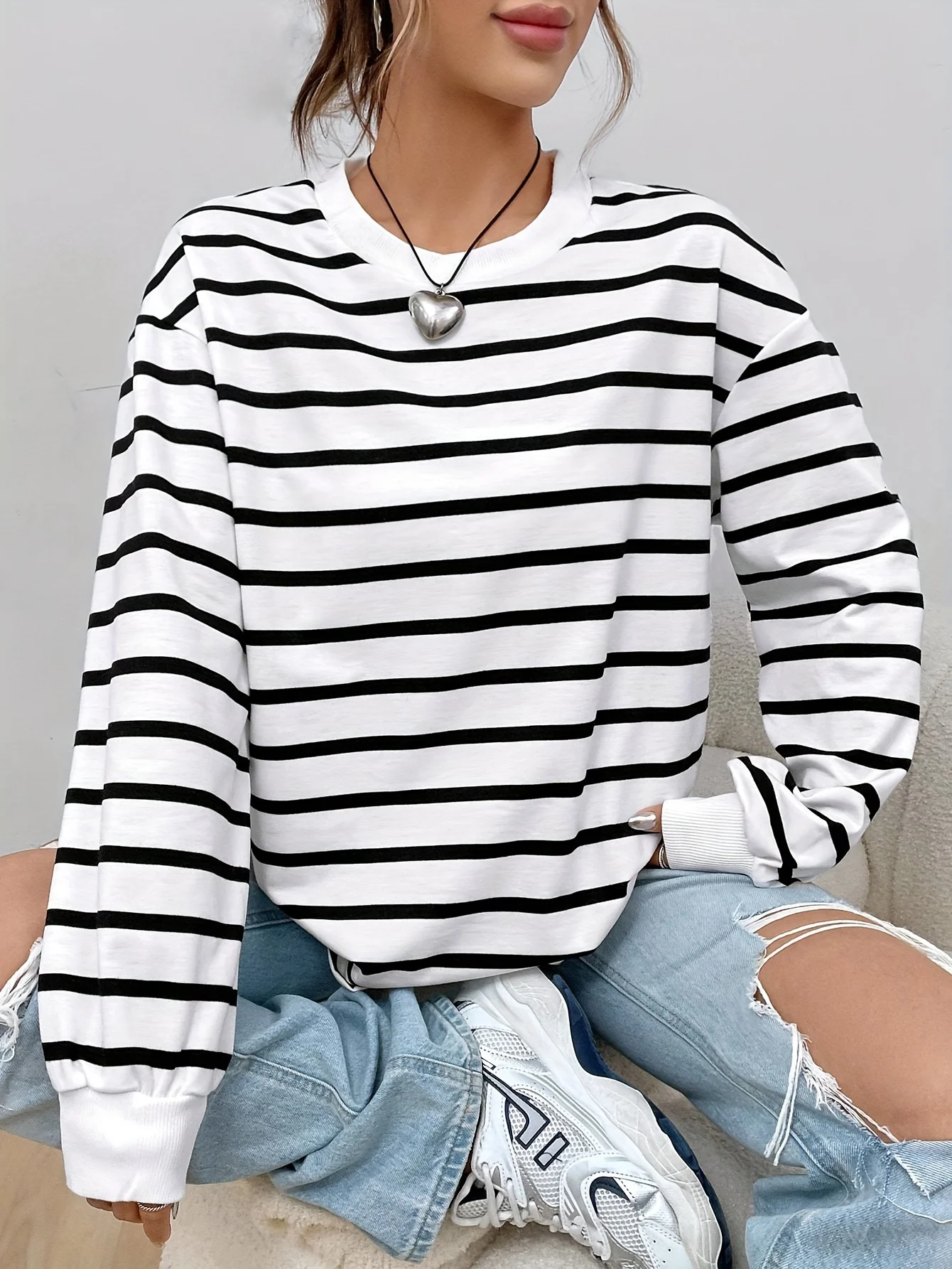 Plus-size striped block T-shirt, casual round neck off shoulder long sleeve T-shirt, suitable for spring and summer women's wear