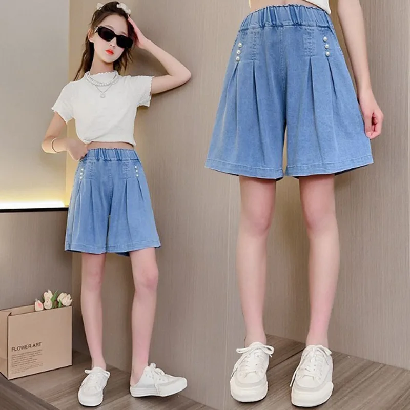 

Новые летние детские шорты, тонкие джинсовые брюки 5-дюймовой длины и юбка из тенсела: универсальный комплект для девочек-подростков. Новинка.