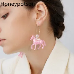 2024new niche girl heart design, fashion personality trend unicorn pink pearl magic color V-shaped earrings hook earrings