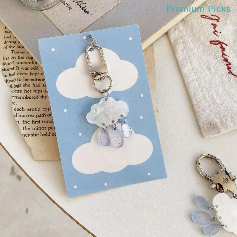 portablePlayful Cloud Raindrop Keychain with Lovely Charms for Modern Mobile Phone and Bag Accessories