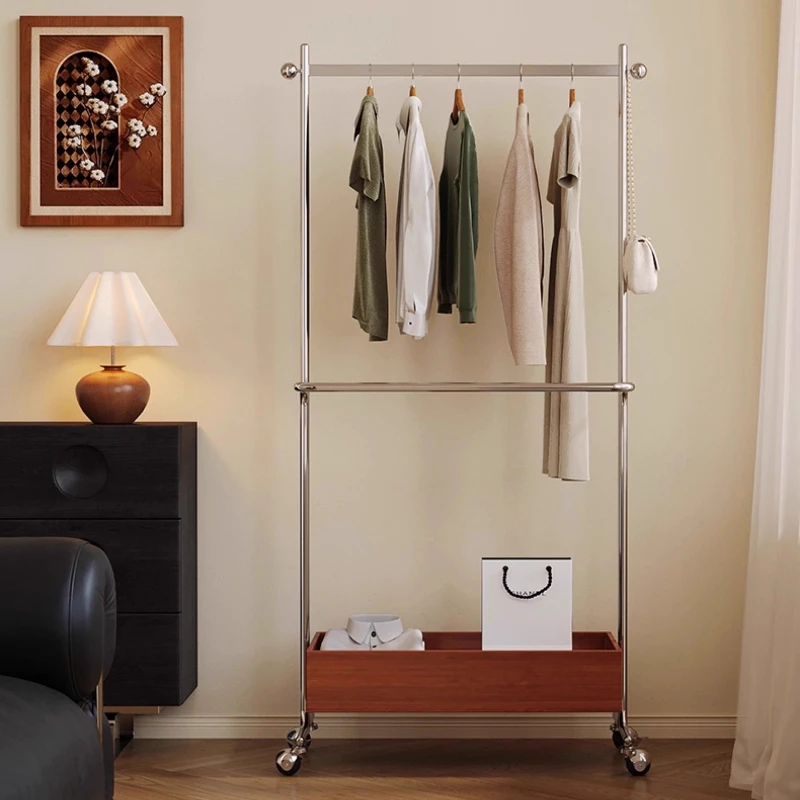 Middle aged master bedroom with wheeled cloth and hat rack,movable double-layer cloth hanging rack,floor mounted cloth hanger
