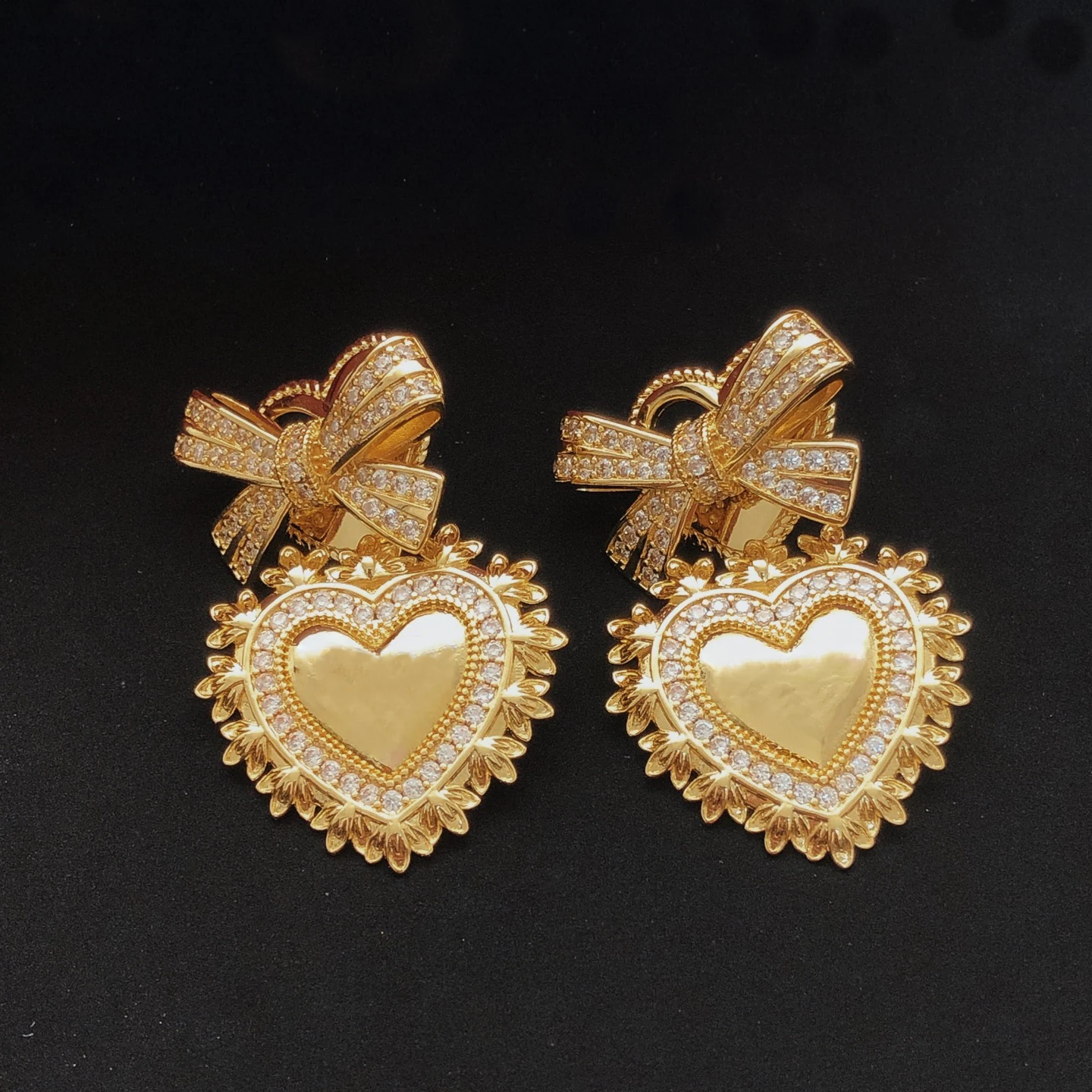 

Gold Heart Earrings with Bow Design Diamond Accents And Sparkling Rhinestone Dangling Pendant Fashion Accessory for Women