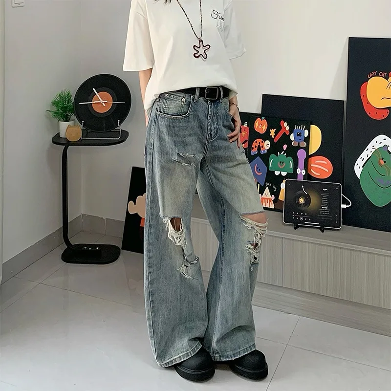 กางเกงยีนส์ทรงตรงหลวมสไตล์อเมริกันเรโทรแบบใหม่ ลายข้อต่อบาบูมไม้ ขาดๆ สำหรับผู้ชายและผู้หญิง สวมใส่สบายและใช้งานได้หลากหลาย