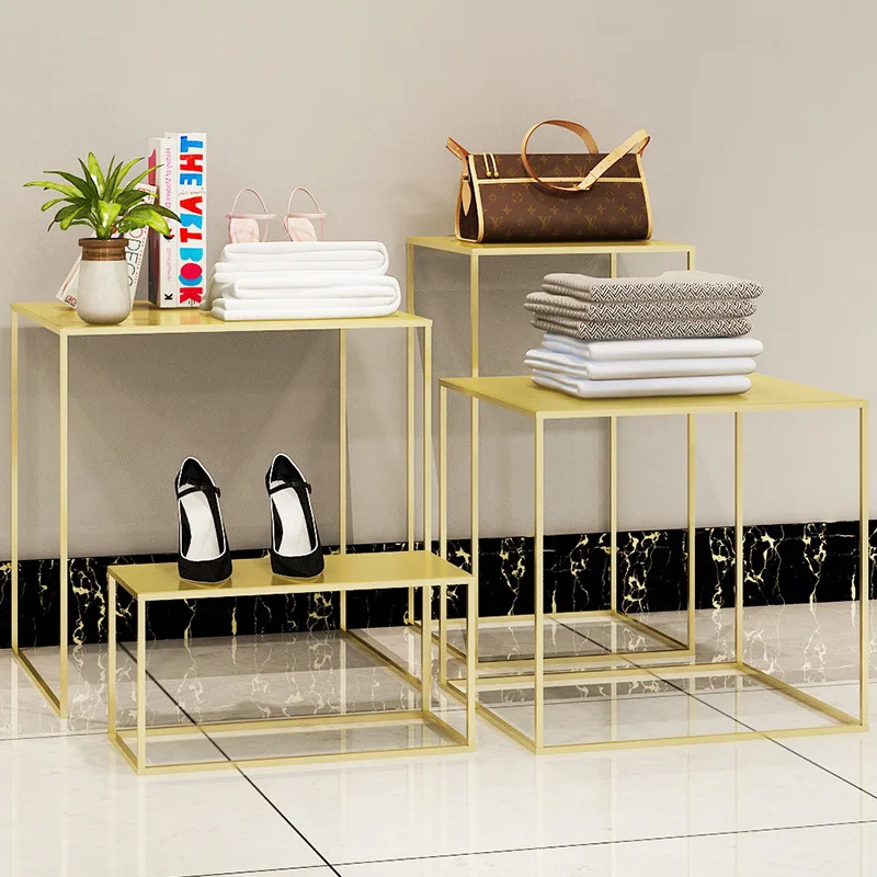 

Clothing store decorative shelves, window display tables, Nakajima high and low water table display shelves, golden light luxury