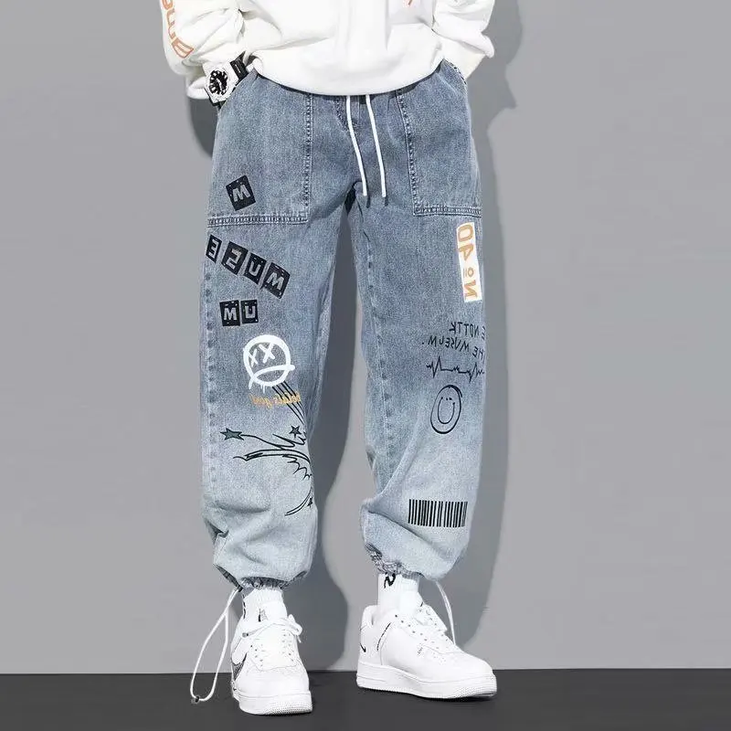 New Fashion Men's Loose Fit Denim Jeans with Cartoon Graffiti Print, Elastic Drawstring Waist and Ankle-tied Cuffs