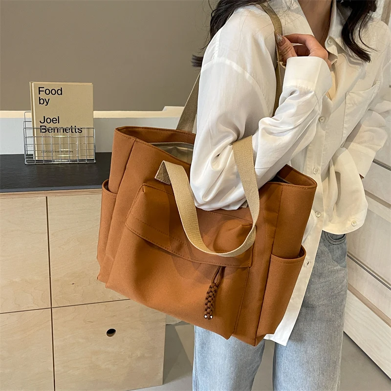 Canvas bag for women with large capacity, 2024 new casual shoulder bag, summer college student commuting tote bag