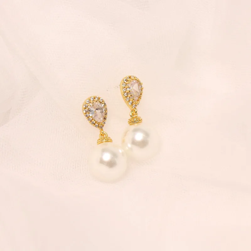 

Hundreds of temperament water drop inlaid diamond pearl earrings Elegant earrings jewelry ladies