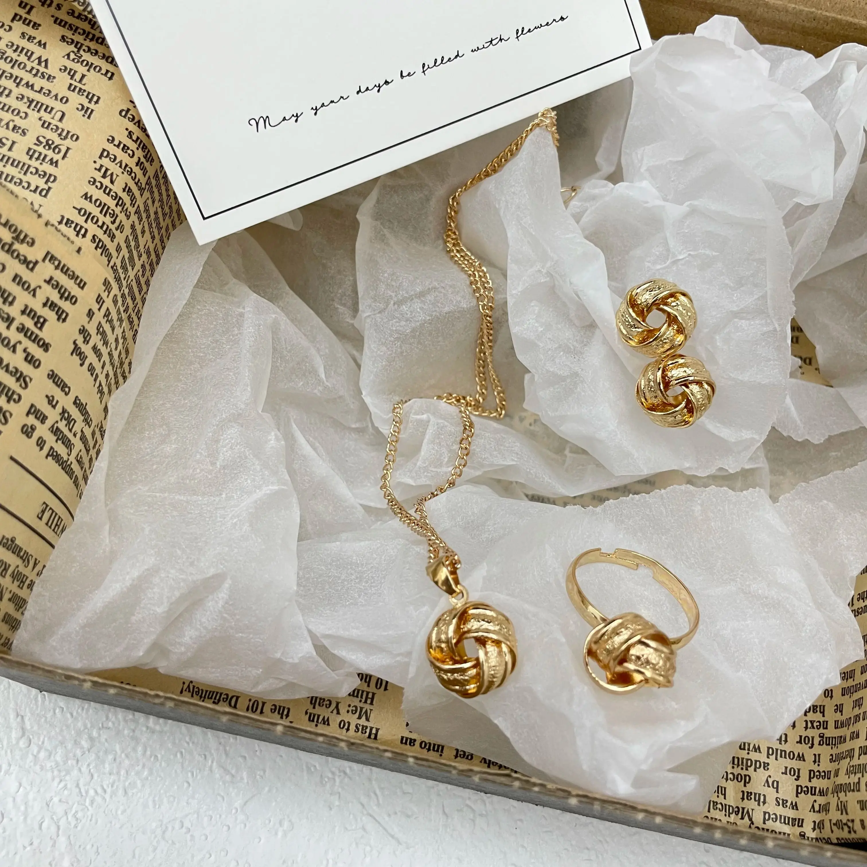 

New collection of jewelry set three-piece set featuring creative, high-end, three-dimensional knot-shaped ring, earring,necklace