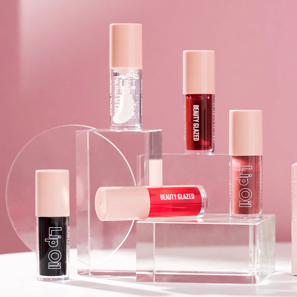 rystal Jelly Lip Oil - ลิปบาล์มให้ความชุ่มชื้นและอวบอิ่มพร้อมพื้นผิวมัน ผสมกับสควาเลนจากพืช เหมาะสําหรับนุ่มนวล