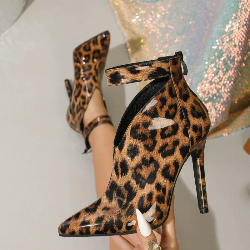 

Autumn and winter new pointed patent leather leopard print sexy hollow boots banquet large-size high-heeled short women's boots