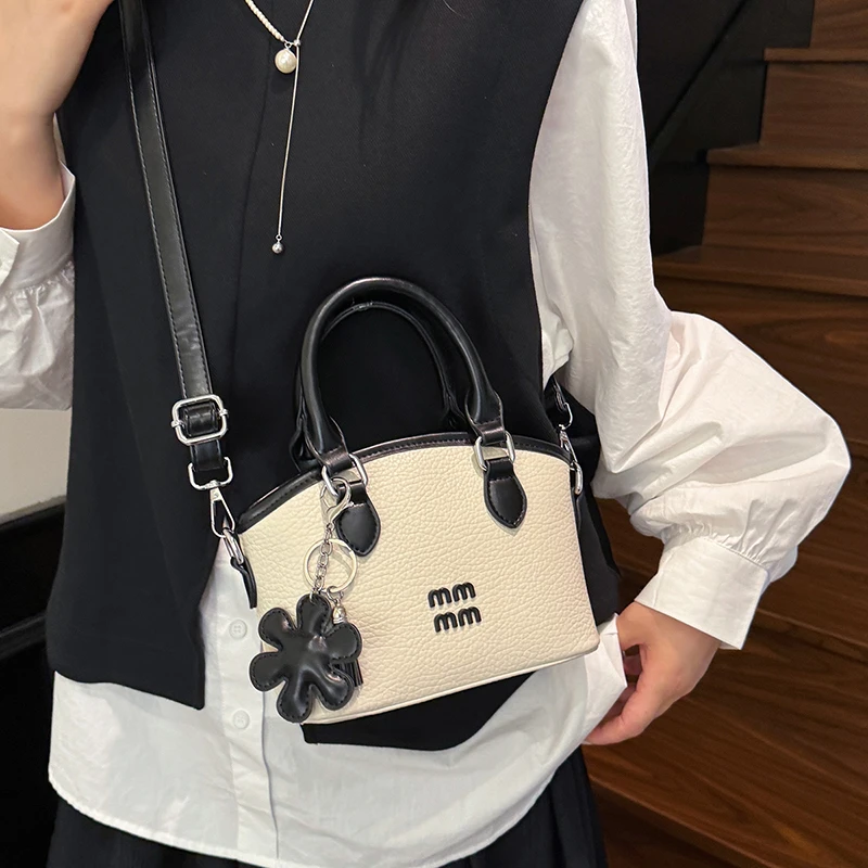 

Popular Ladies Handbag With Leather Handles - Elegant Tote Style Crossbody Option By Famous Luxury Brand