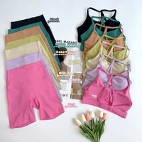 Conjunto de Yoga y bicicleta para gimnasio de Color sólido, Legging corto con espalda cruzada, Sujetador deportivo, chándal de 2 piezas, traje de gimnasio atlético para mujer, entrenamiento integral 👚