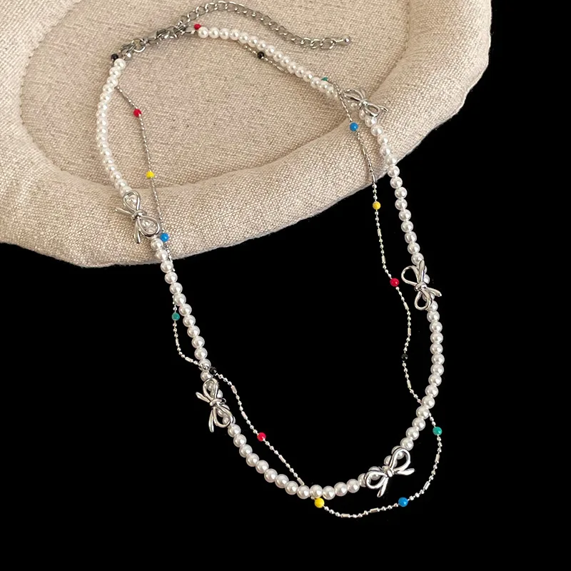 

Minar Sweet Cool Multicolor Enamel Bowknot Simulated Pearl Beaded Necklace for Women Double Layered Beads Chain Strand Chokers