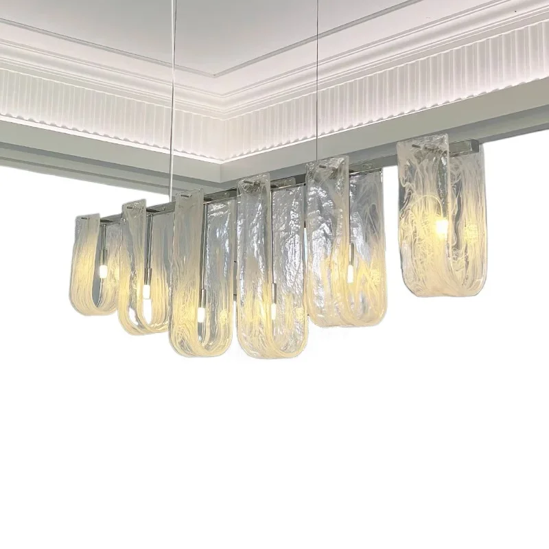 

French light luxury restaurant, chandelier designer Italian minimalism, cloud glass bar island, one-word long art lamp