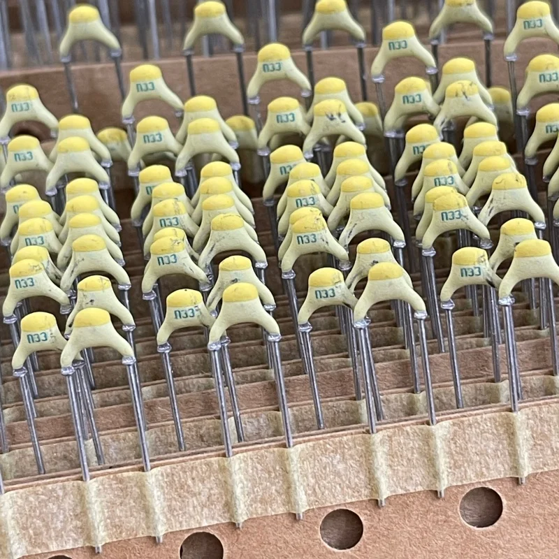 10PCS 330PF 100V N33 331K Copper-foot silver film ceramic capacitor P5