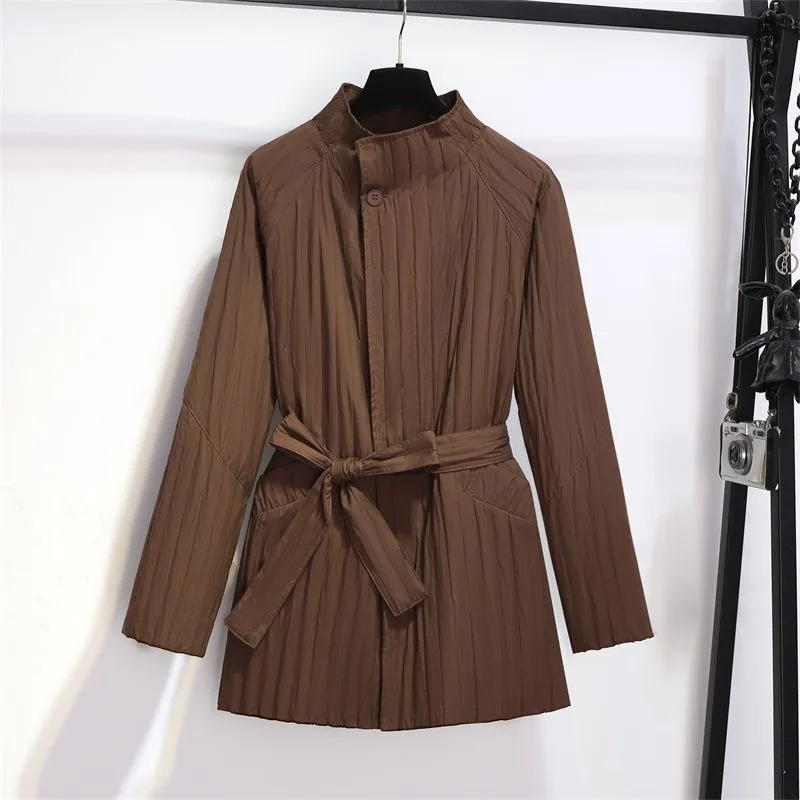 Autunno Inverno La giacca in cotone in vita da donna 2025 Nuova moda allentata pendolarismo vento colore puro tuta sportiva nera femminile