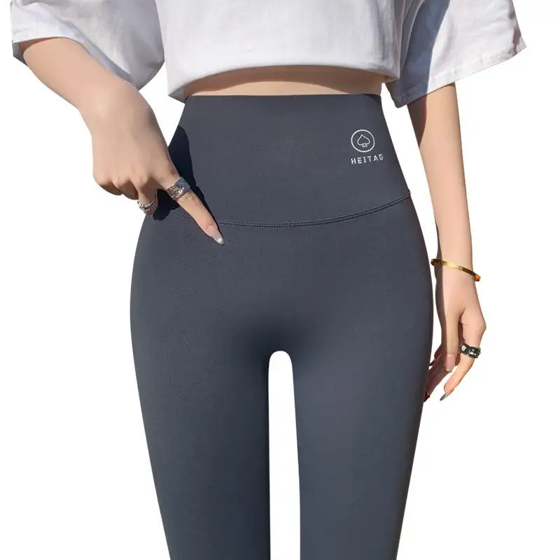 スリム効果ナイロンアーックスキンヨガパンツハイウエストおなかコントロールタイトフィットヒップリフティング薄い女性のパンツ